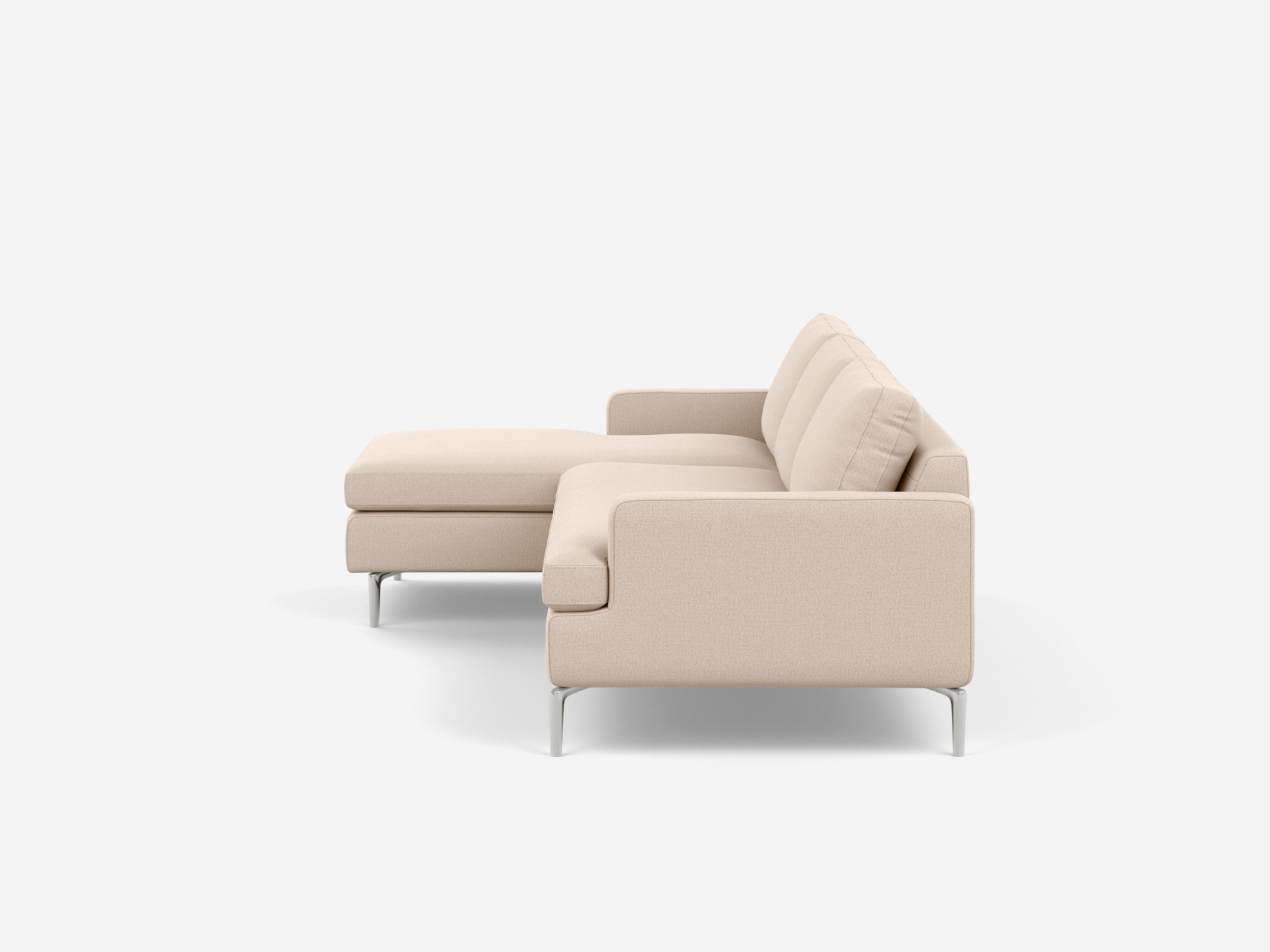 side view of the Eve Grand modular sofa in white fabric with left hand chaise